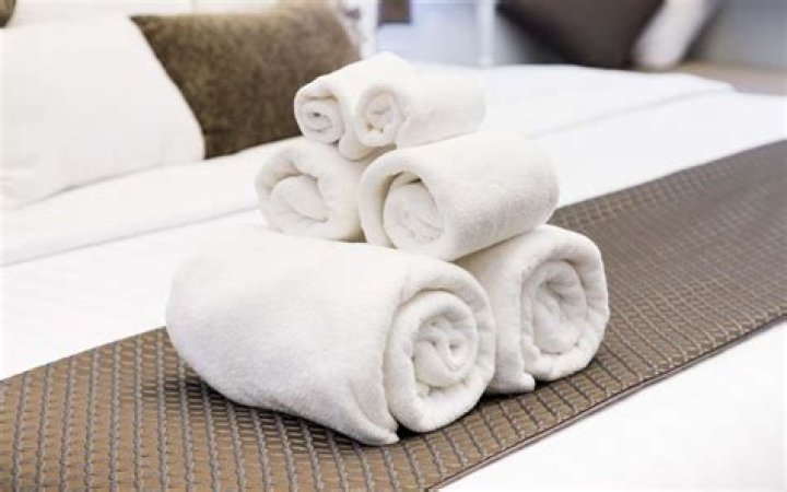 How do hotels keep their towels so white and fluffy?